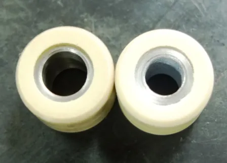 Dua roller CVT berwarna terang ditampilkan berdampingan.